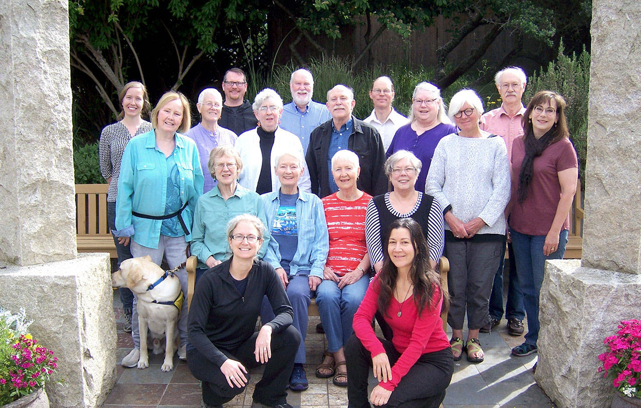 The 2017 singers for the Candlelight Concert Series pose for a group photo. (Richard Purnell)
