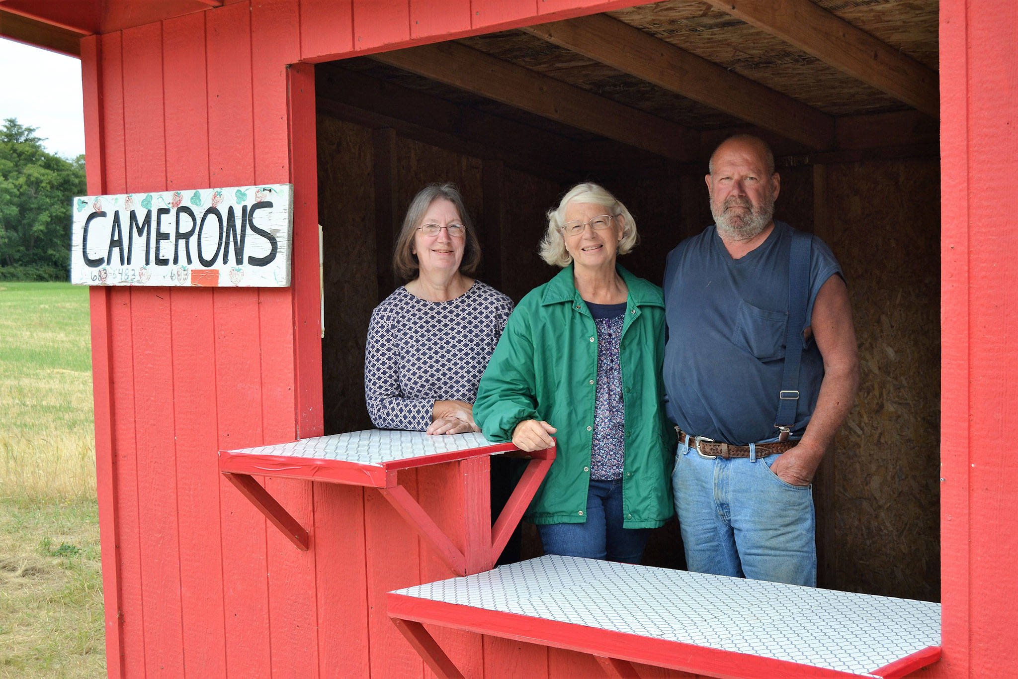 Peggy Adams, on left, and her cousins Sidne and Dave Cameron decided to close down Cameron’s Berry Farm off Woodcock Road this year after more than 40 years in operation. (Matthew Nash/Olympic Peninsula News Group)