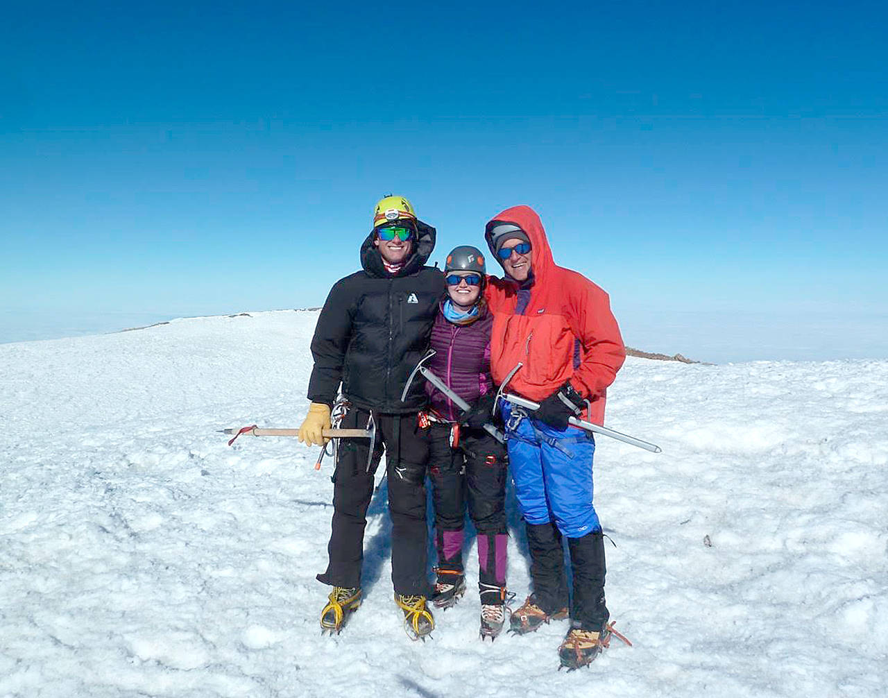 Madeline (Nolan) Read (center), her dad Mike Nolan of Port Angeles (right) and her husband Andy Read summited Mount Rainier on Sunday, July 23. Madeline is a BLANK Port Angeles High School graduate. Her great-grandmother Effie Burnard climbed the mountain in 1919. Following in my great-grandma’s footsteps and summiting Mt. Rainier has been on my ‘Bucket List’ for quite a while.
