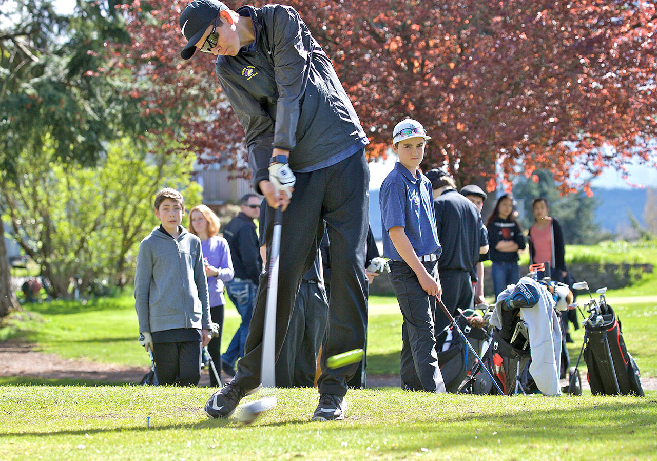 Steve Mullensky/for Peninsula Daily News                                Sequim&rsquo;s Blake Wiker tees off during a match against Port Townsend. Wiker, a sophomore, is the All-Peninsula Boys Golf MVP.