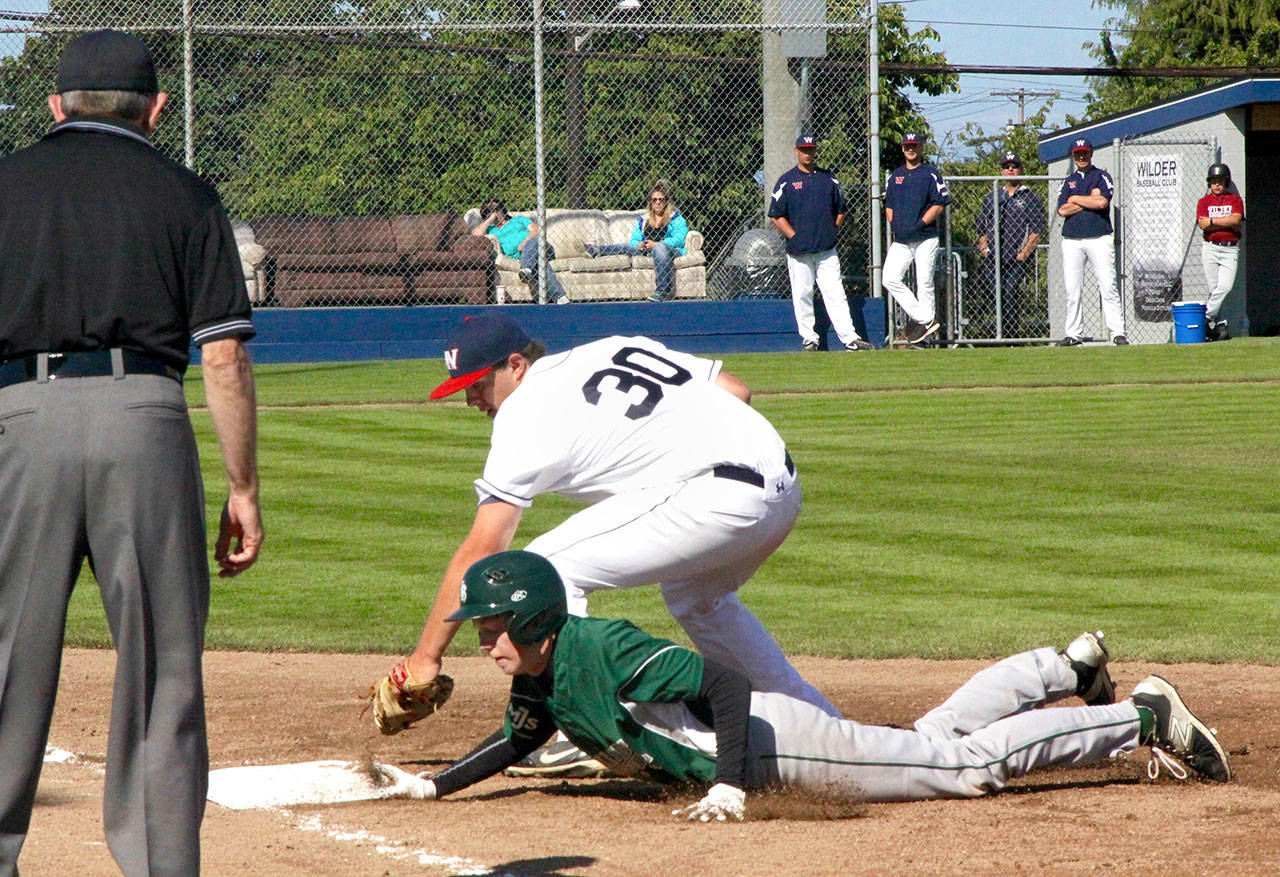 Dave Logan/for Peninsula Daily News                                Wilder&rsquo;s Kole Milyard (30) tries to pick off Christian Gainer of Lakeside Recovery. Gainer was able to get in safely under the tag.