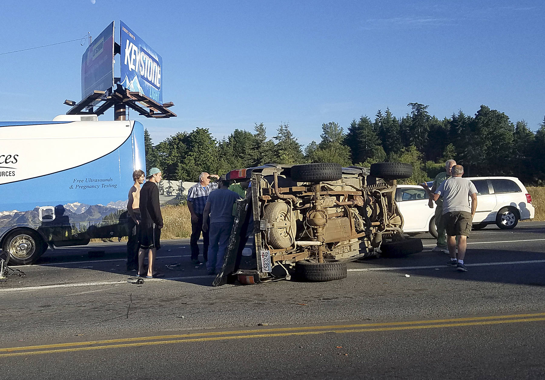 A 1997 Ford Ranger flipped at about 7:40 p.m. Tuesday at U.S. Highway 101 and Kolonels Way east of PortAngeles. (Jesse Major/Peninsula Daily News)