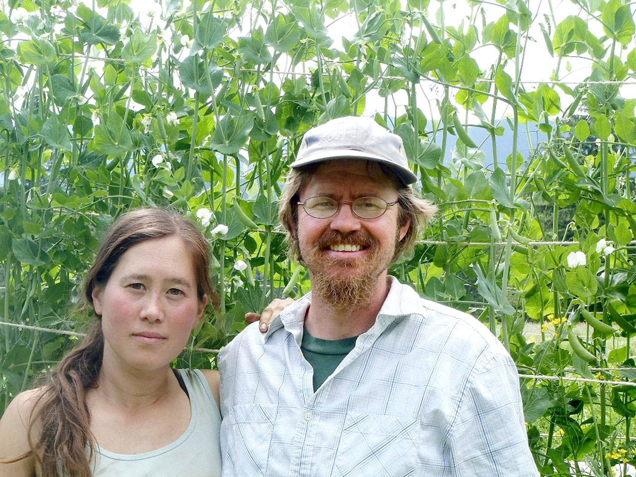 Farmers Marko Colby and Hanako Myers have permanently protected their 29-acre Quilcene farm through the Jefferson Land Trust.