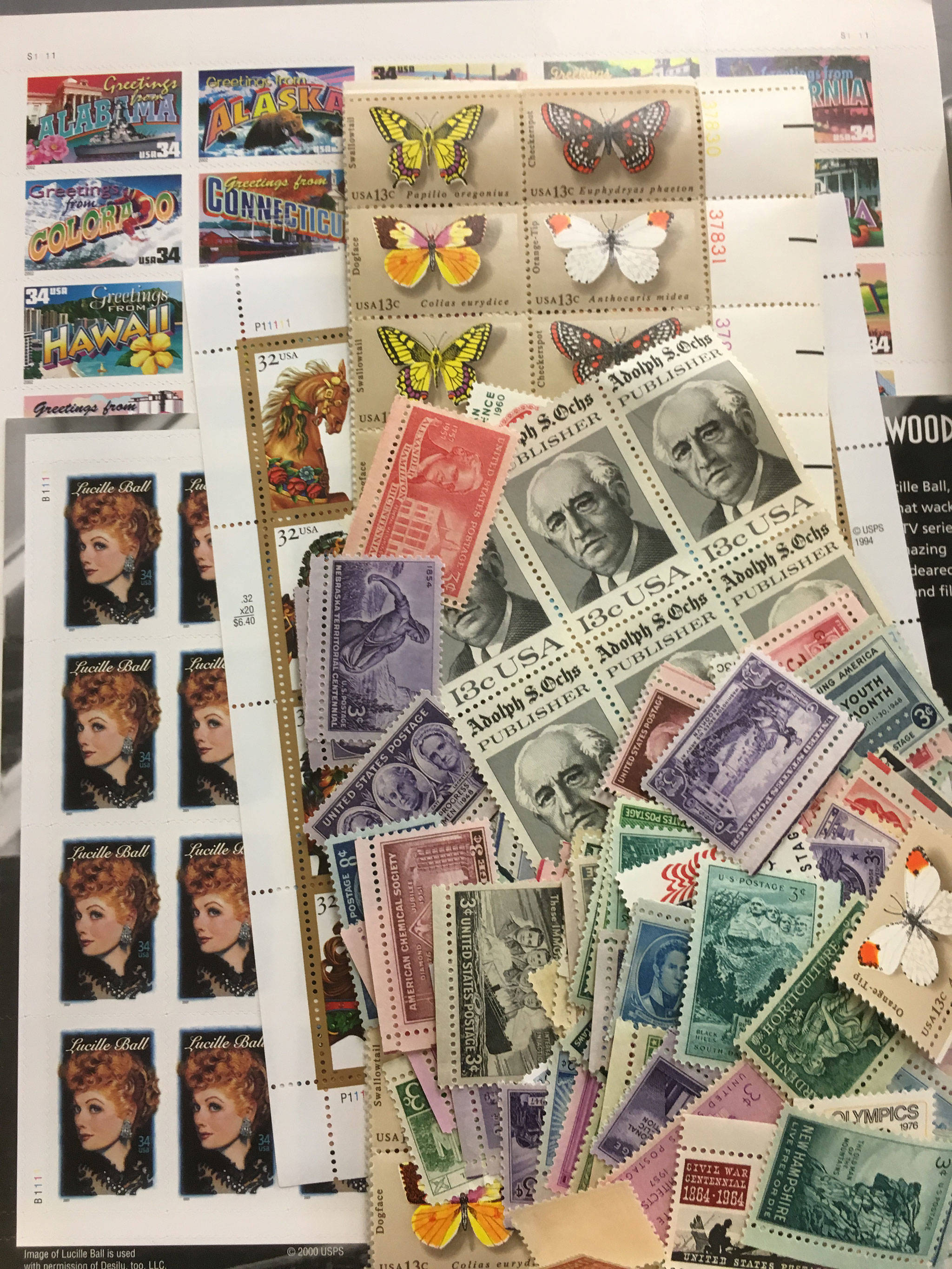 Henry Jones of the Strait Stamp Society said he creates stamp kits to donate and/or auction off so that people can have stamps to help beautify their mail because today’s stamps can be boring. (Matthew Nash/Olympic Peninsula News Group)