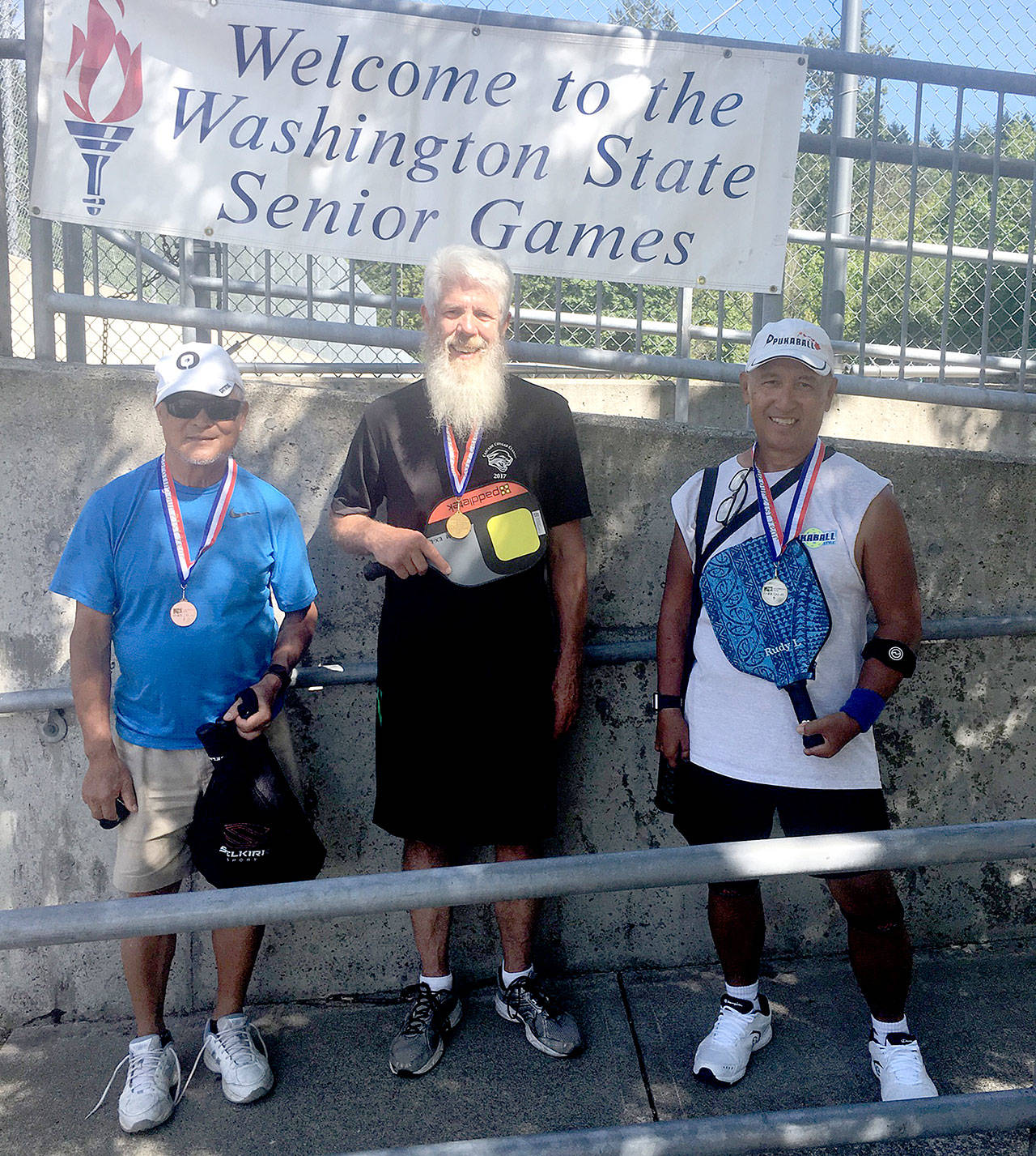 The 70-plus 3.5 singles’ winners in the Pickleball competiton at the Washington Senior Games held on July 21-23. From left, are Yim Lee of Seattle (bronze), Steve Bennett of Port Angeles (gold) and Rudy Lopez of Hawaii (silver).