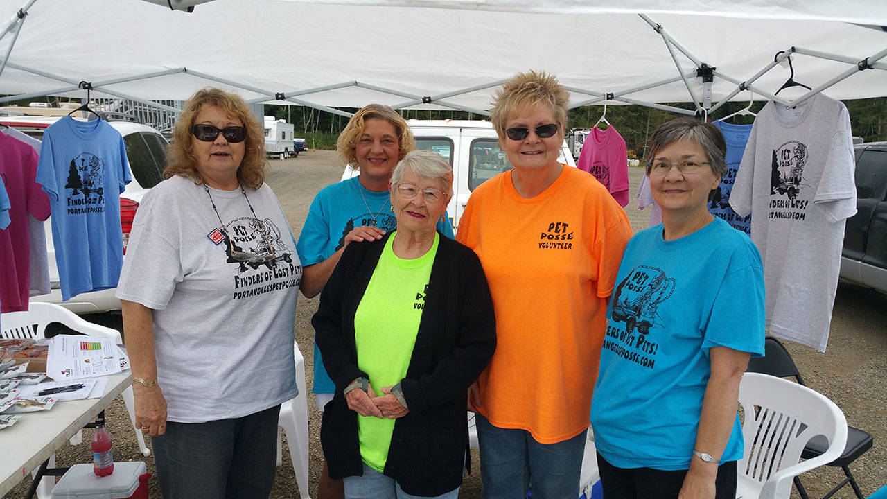 Founders and core volunteers for Port Angeles Pet Posse set up an information tent at the Run-A-Muck in July 2015. The Pet Posse is, from left, Shari Hamilton, Shell’ey Van Cleave, Bev Jacobs, Gail Nivala and Lynn Whited. (Pet Posse)