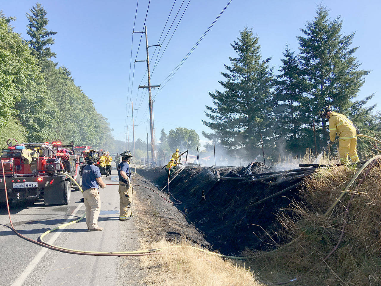 Bill Beezley/East Jefferson Fire-Rescue                                A small grass fire shut down state Highway 19 while crews doused the area. The fire was likely sparked accidentally by a cigarette thrown from a passing vehicle, officials said.