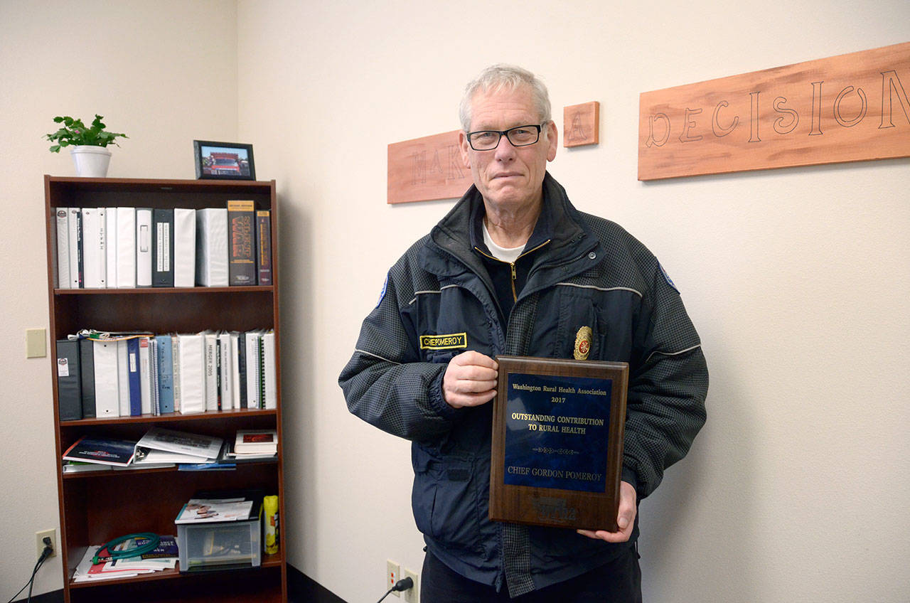 East Jefferson Fire-Rescue Chief Gordon Pomeroy was honored in March for his work with Jefferson Healthcare on responding to patients that have gone into cardiac arrest. (Cydney McFarland/Peninsula Daily News)