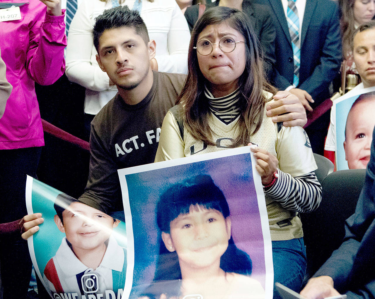 Dreamers Karen Caudillo, 21, of Florida is comforted by Jairo Reyes, 25, of Rogers, Ark., as Sen. Kamala Harris, D-Calif., accompanied by members of the House and Senate Democrats, speaks during a news conference on Capitol Hill in Washington, D.C., on Wednesday. House and Senate Democrats gather to call for Congressional Republicans to stand up to President Trump&rsquo;s decision to terminate the Deferred Action for Childhood Arrivals (DACA) initiative by bringing the DREAM Act for a vote on the House and Senate Floor. (Jose Luis Magana/The Associated Press)