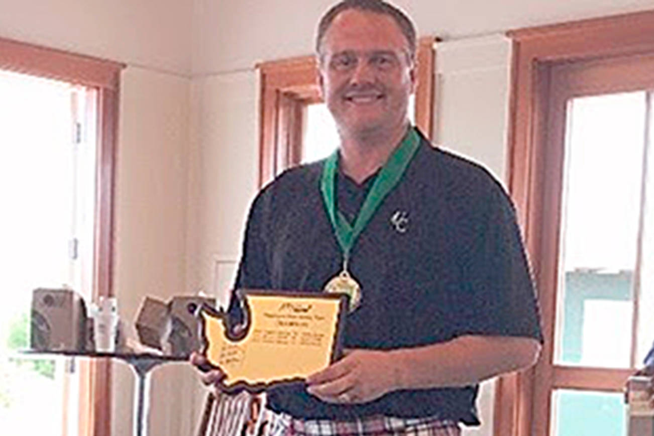 GOLF: Port Townsend’s Tonan wins old-time hickory title