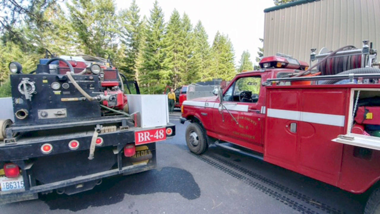 Firefighters Tyler Reid and Jessica Adams have returned safely to Port Angeles after spending one week working at the Jolly Mountain Fire.