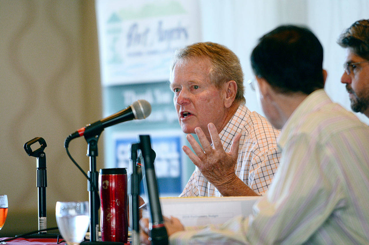 Clallam County Commissioner Randy Johnson talks about the county’s 2018 preliminary roll-up budget during a presentation Wednesday at the Port Angeles Business Association and Port Angeles Regional Chamber of Commerce luncheon. (Jesse Major/Peninsula Daily News)