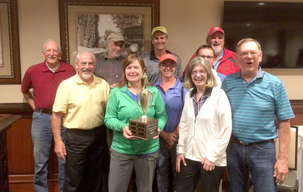 Dungeness Golf Shop claimed the Cedars at Dungeness Merchant&rsquo;s League title this season. Team members are, front row from left, Barb Burrows, Lisa Ballantyne, middle row, Barry Tuteur, Jan Clendening, Richard Clendening, Ray Ballantyne and back row, Steve Lewis, Kris Lether, Jeff Jones and Vern Ahrendes. Not pictured: Steve Collatz and Rob Onnen.                                (Barry Tuteur)