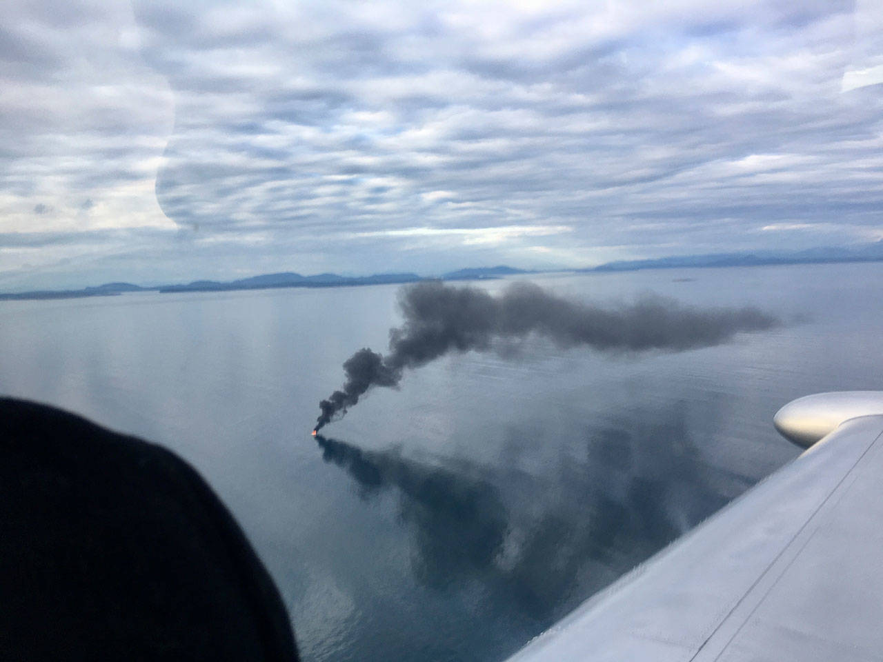 This yacht burned and sank off the west coast of Whidbey Island on Thursday. (Ruth Garasi)