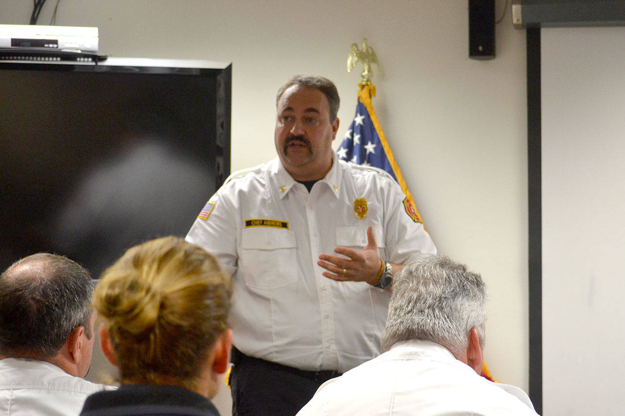 Fire Chief Ben Andrews for Clallam County Fire District 3 speaks Sept. 12 at a fire commissioners’ special meeting about whether fire commissioners accept a federal grant to help pay wages and benefits for six firefighters over three years. (Matthew Nash/Olympic Peninsula News Group)