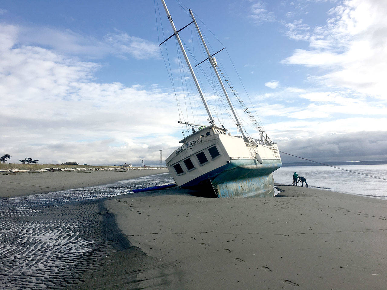 The schooner Nina Otaki was high and dry on the beach at Fort Worden State Park after being blown ashore Sept. 17. (Erik Wennstrom)
