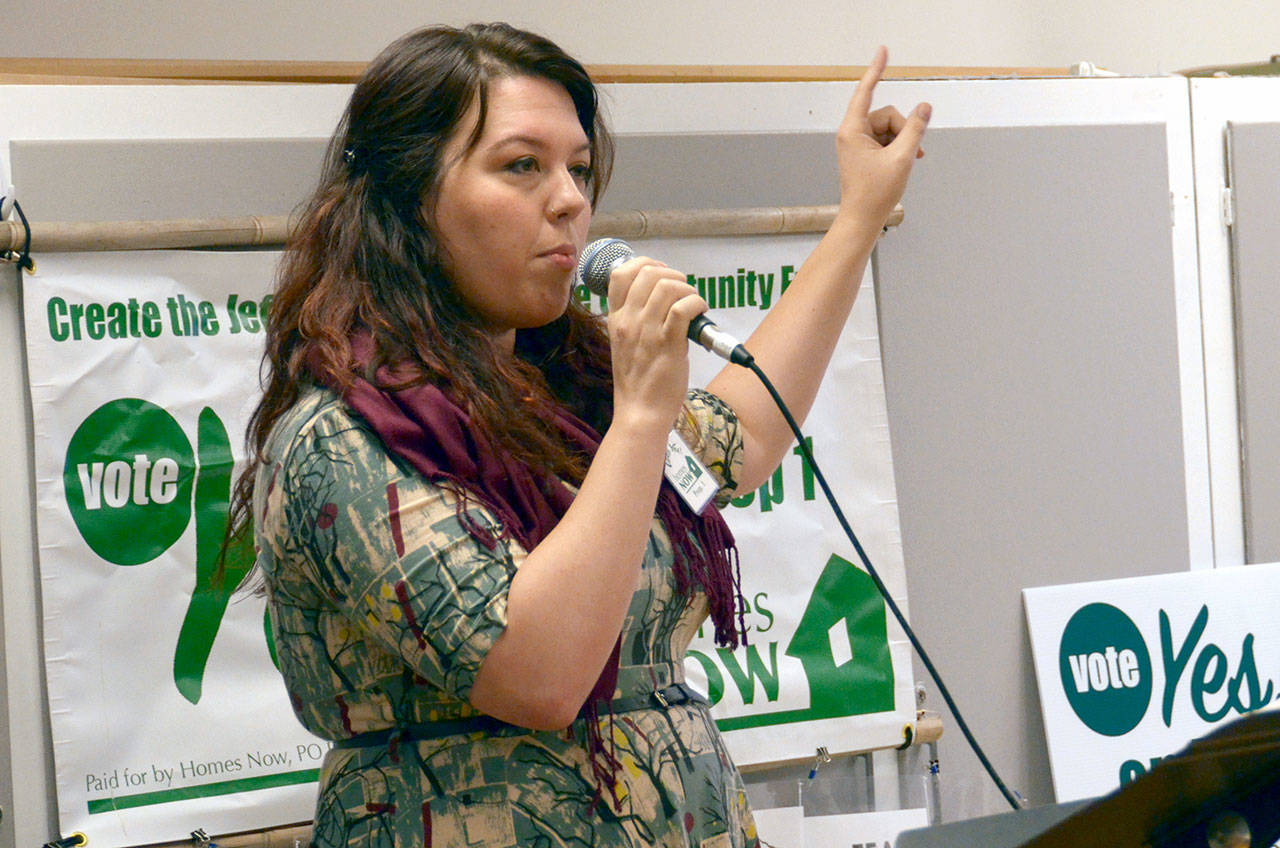 Aislinn Palmer of Bayside Housing and Services presents on Proposition 1 during a Homes Now information event at the Tri-Area Community Center in Chimacum. (Cydney McFarland/Peninsula Daily News)