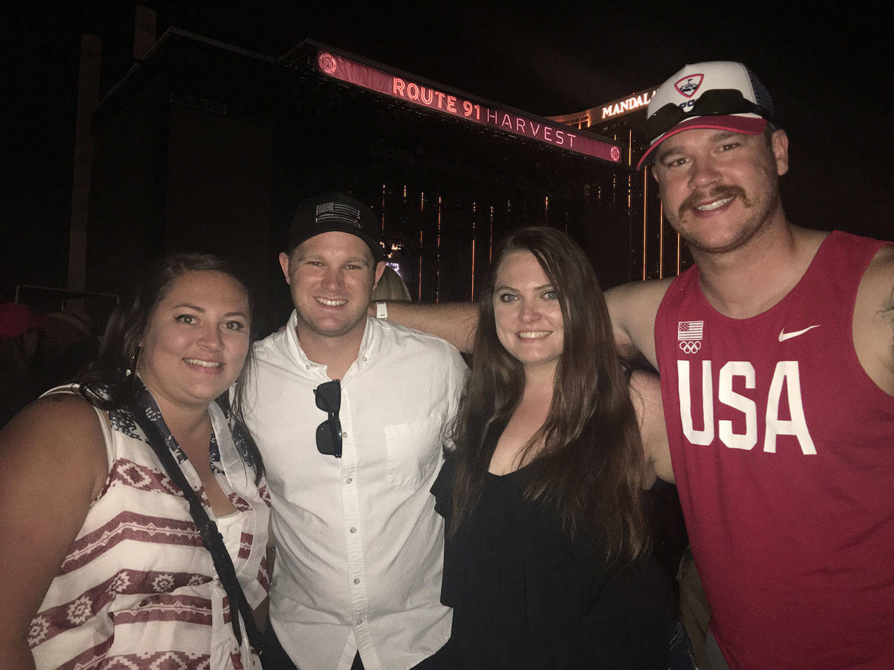 Ali Pendergrass, Nick Pendergrass, Alicia Hounsley and Tyler Hickman, from left, pose for a photo outside the Route 91 Harvest Music Festival in Las Vegas, moments before a gunman opened fire on the crowd of concertgoers, killing 58 and injuring 527. (Ali Pendergrass)