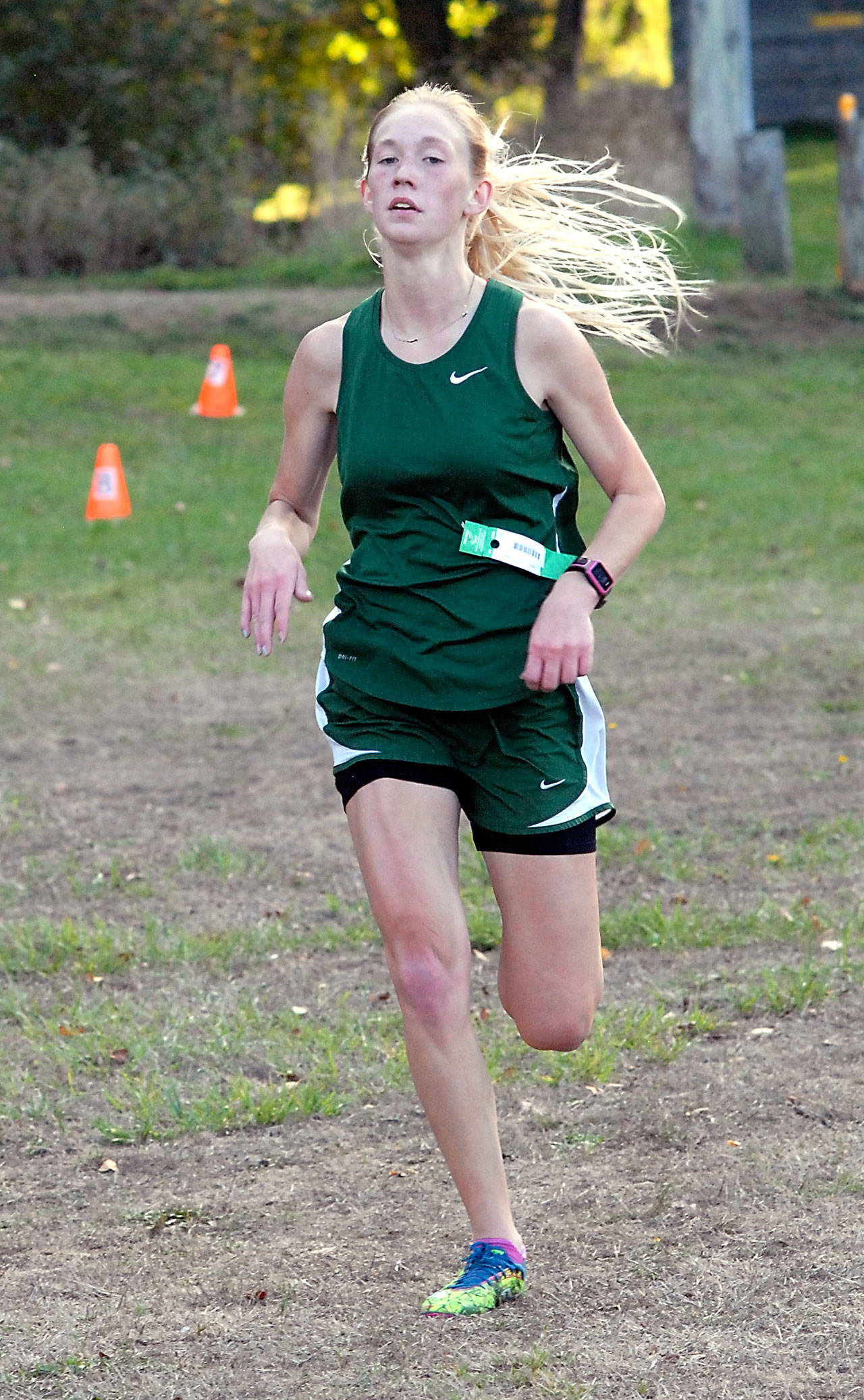 Keith Thorpe/Peninsula Daily News Port Angeles’ Gracie Long heads to a first place finish in the girls cross-country race on Wednesday at Lincoln Park in Port Angeles.