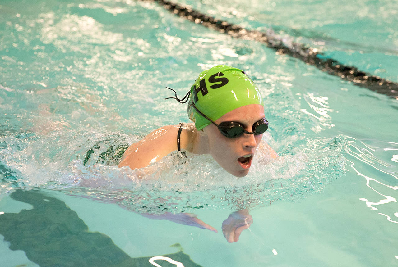 Patty Reifenstahl                                Port Angeles’ Tana Hiigel swims the 100-meter breaststroke against Sequim on Thursday.