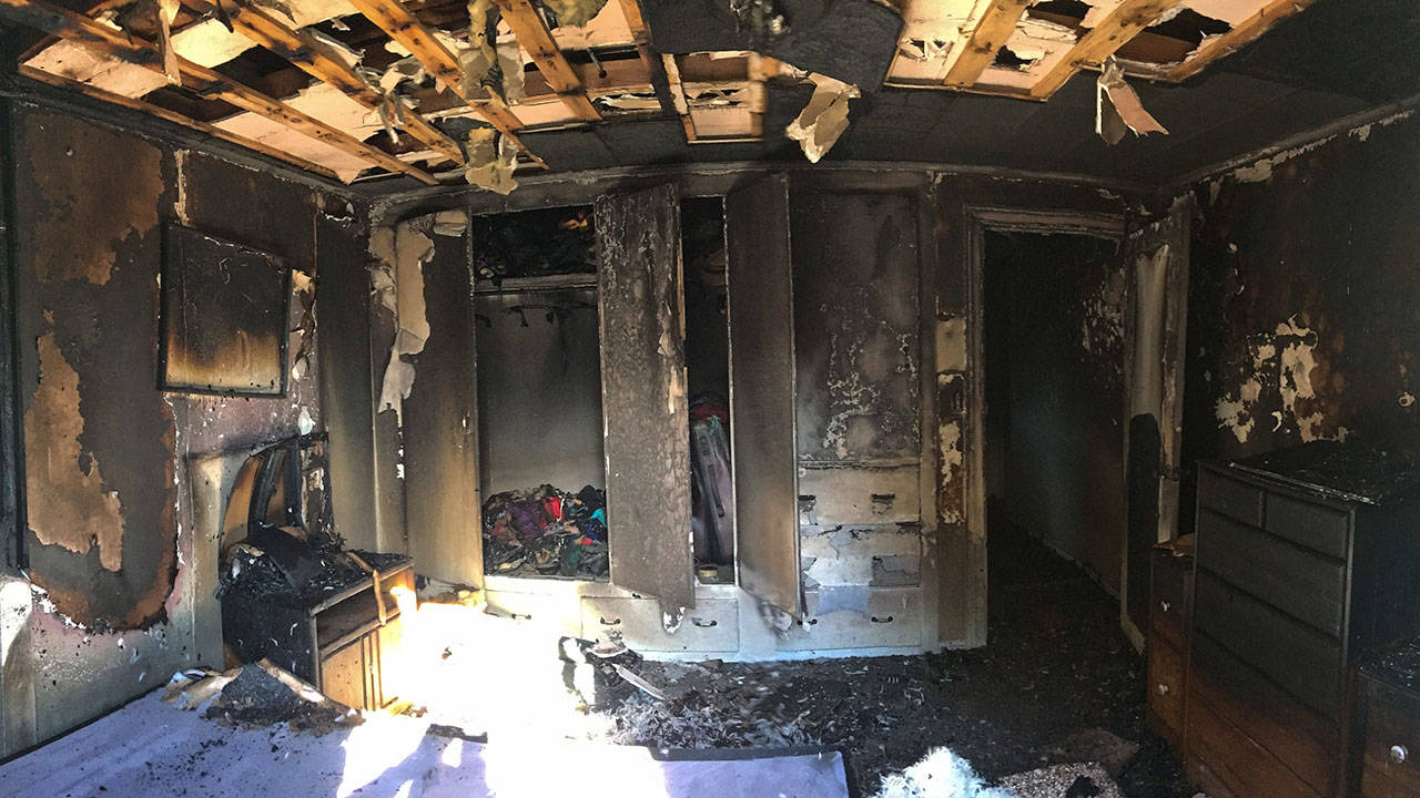 A fire damaged a Port Townsend home Sunday after a candle caught a bedroom on fire. (East Jefferson Fire-Rescue)