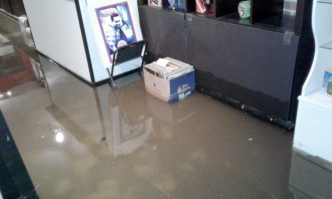 Undertown businesses such as Quimper Sound found up to 8 inches of standing water in their stores earlier this month due to a reportedly failed storm drain. (Mark Hering/Quimper Sound)