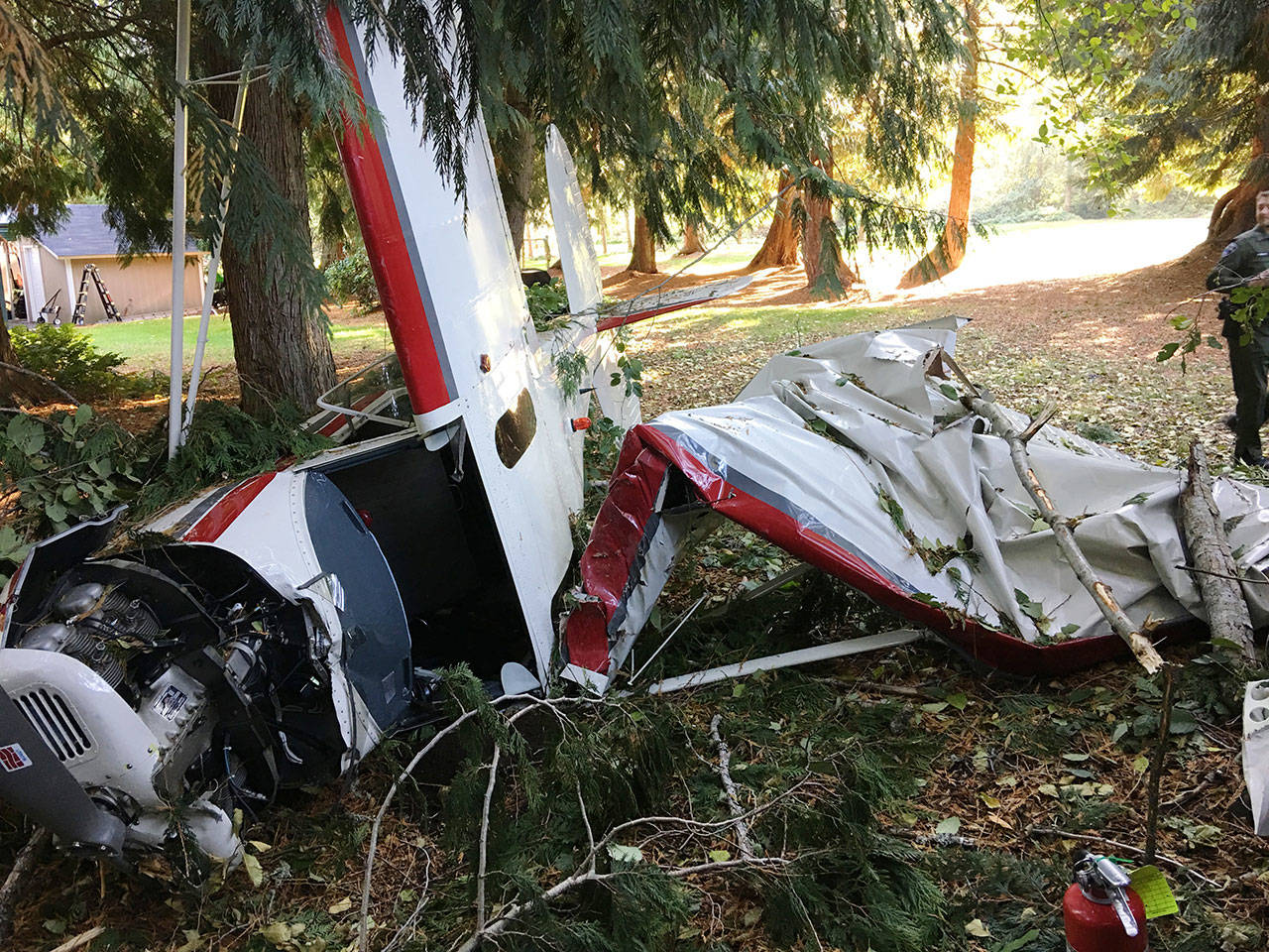 The wreckage of a 1946 Cessna 140 rests just behind Lexar Homes on Kala Square Place in Port Townsend after crashing Monday afternoon. (Bill Beezley/East Jefferson Fire-Rescue)