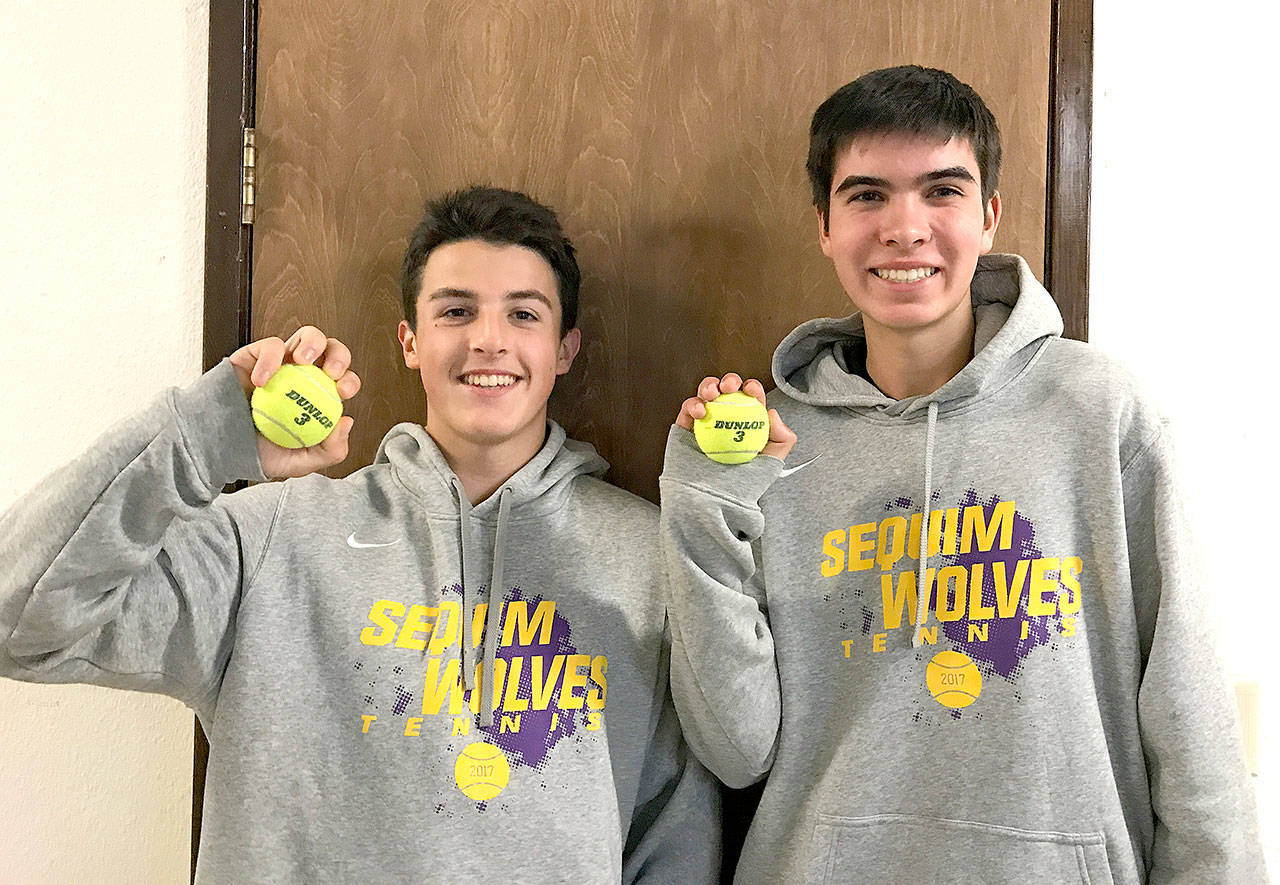 The Sequim tennis doubles team of Thomas Hughes, left, and Blake Wiker won four out of five matches at the West Central District 3 Tournament, qualifying for the state 2A tennis tournament in May.