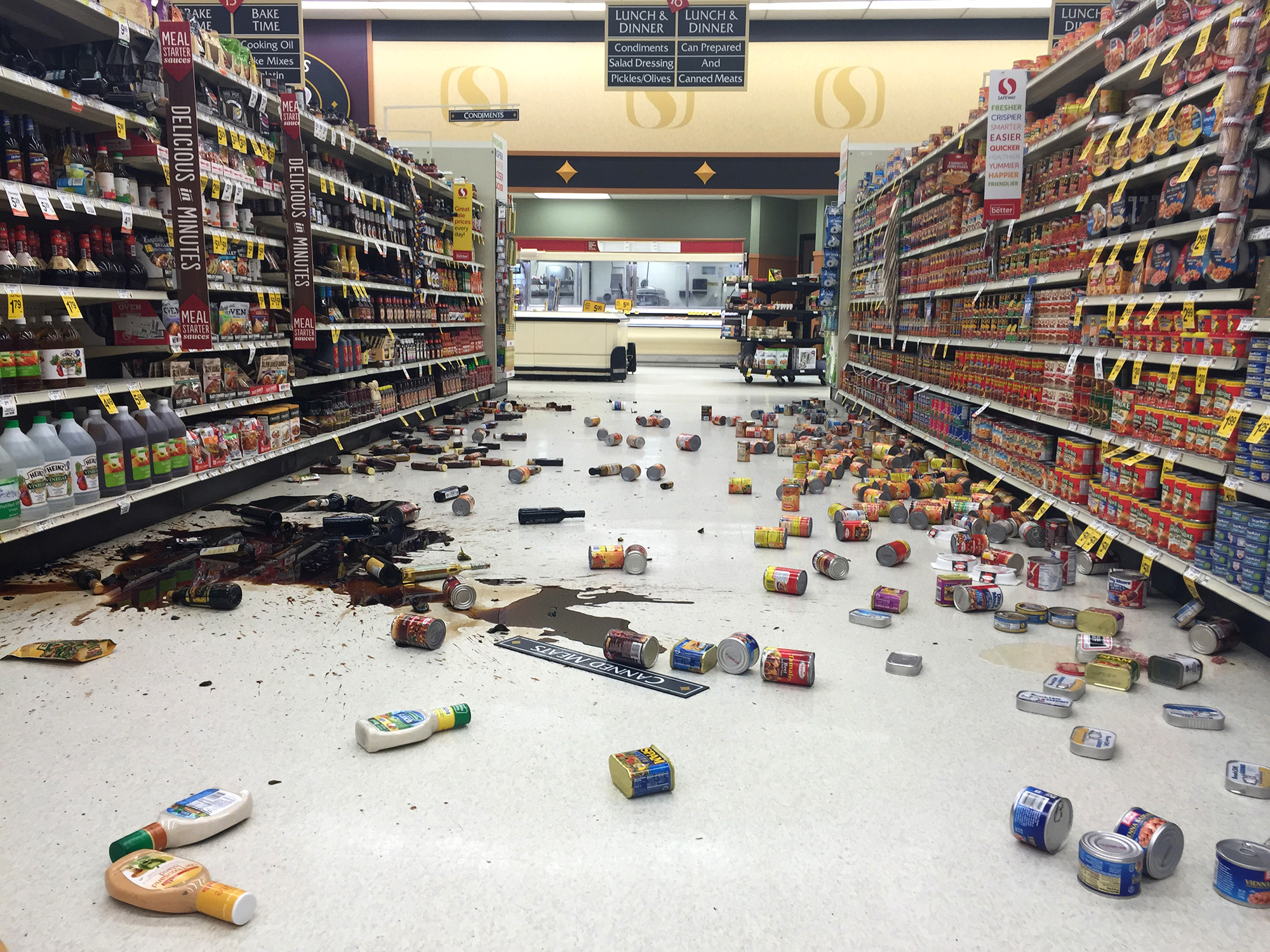 Items fallen from the shelves litter the aisles inside a Safeway grocery store following a magnitude 6.8 earthquake on Sunday in south-central Alaska. The quake knocked items off shelves and walls and jolted the nerves of residents in this earthquake prone region
