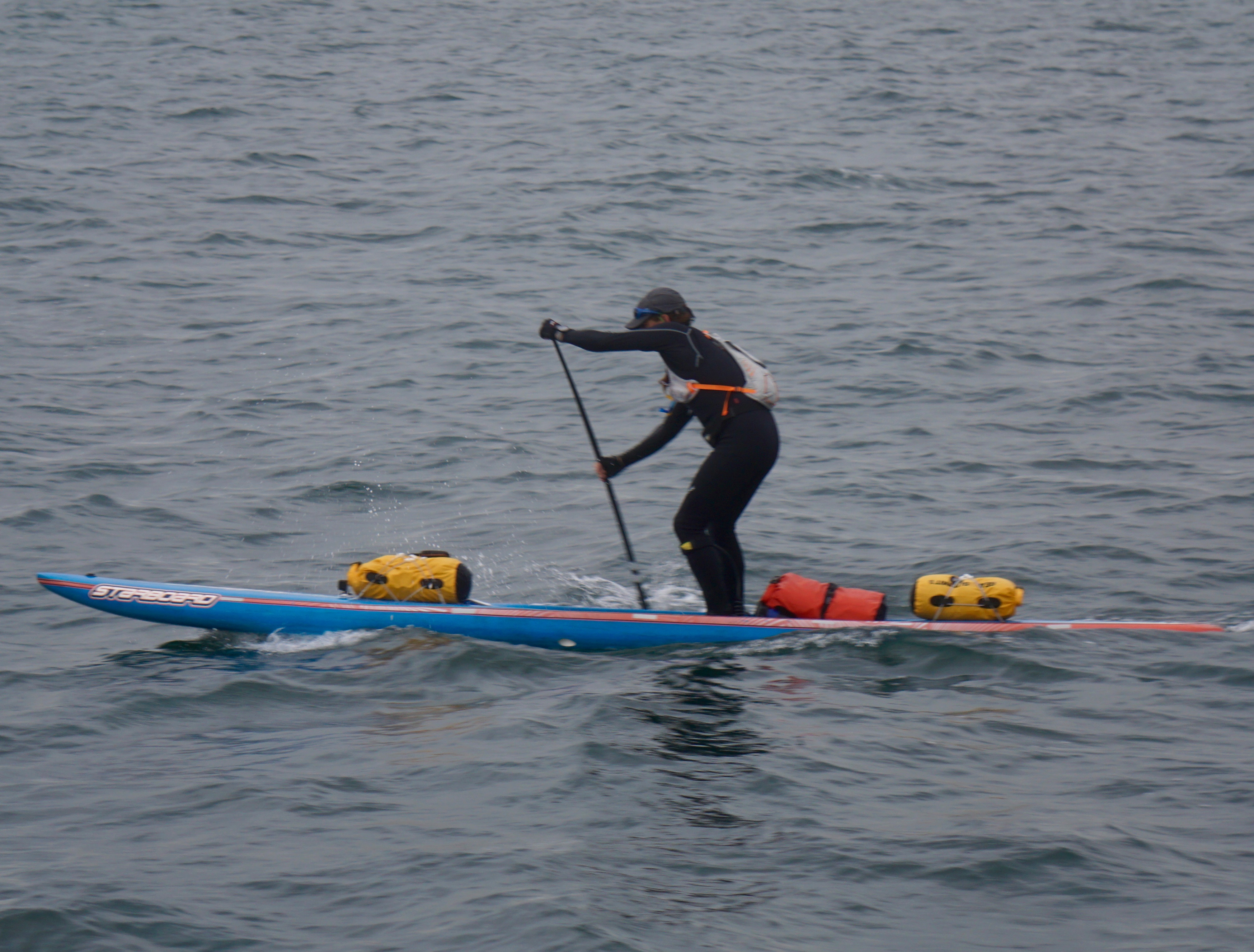 Paddleboarder Karl Kruger seeks to paddle the 750 miles all the way to the finish point in the Race to Alaska. He made it to Victoria to complete the first leg of the race Thursday. (Charlie Bermant/Peninsula Daily News)