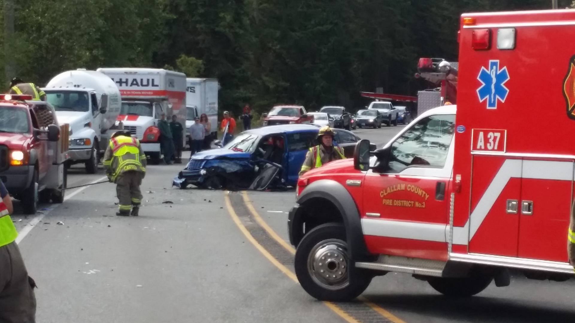 First-responders at the scene of this morning's wreck on U.S. Highway 101 east of Sequim. (Levi Barclay)