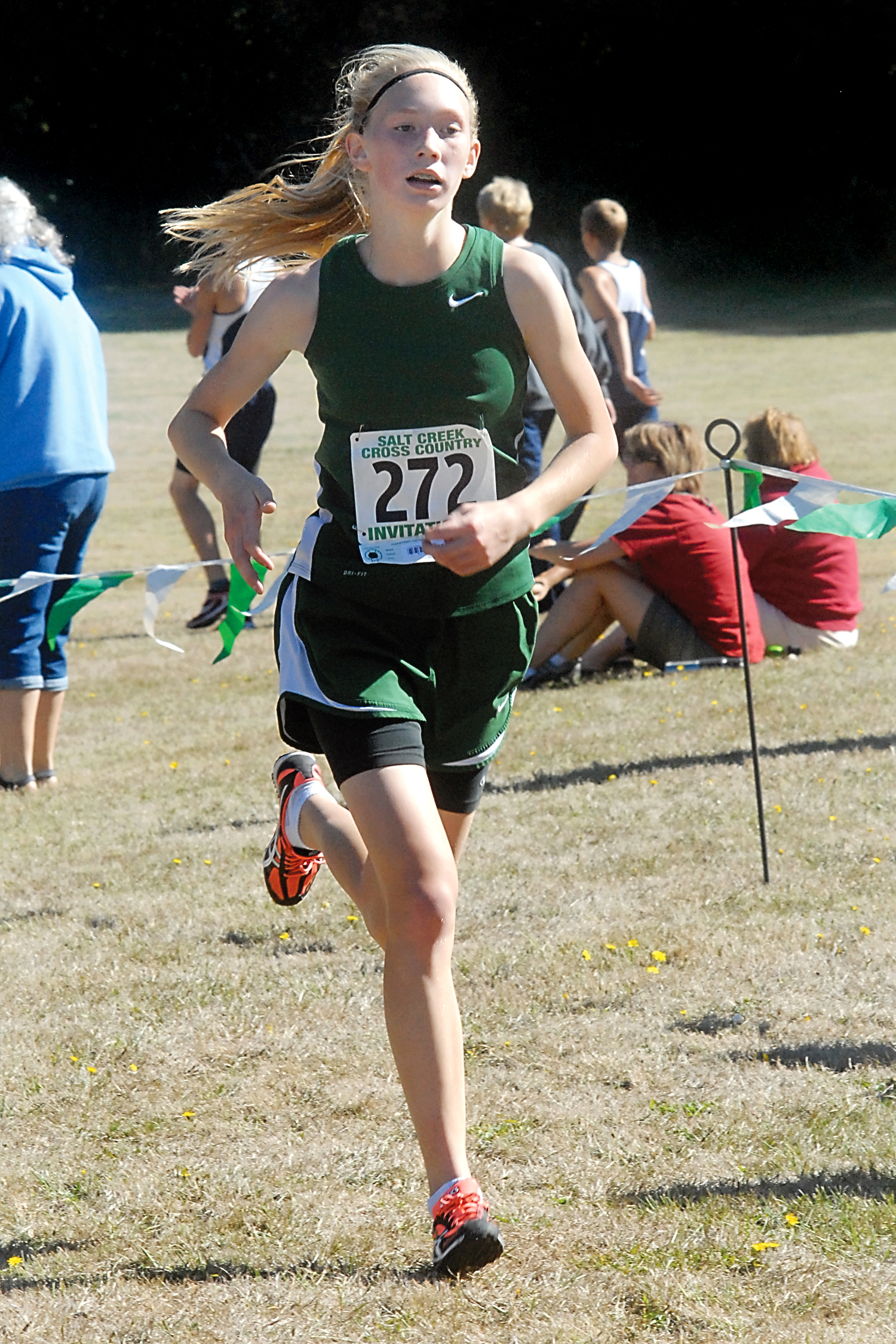 Port Angeles freshman Gracie Long runs to a second-place finish at the Salt Creek Invitational in September. Long won league and district titles this season. (Keith Thorpe/Peninsula Daily News)
