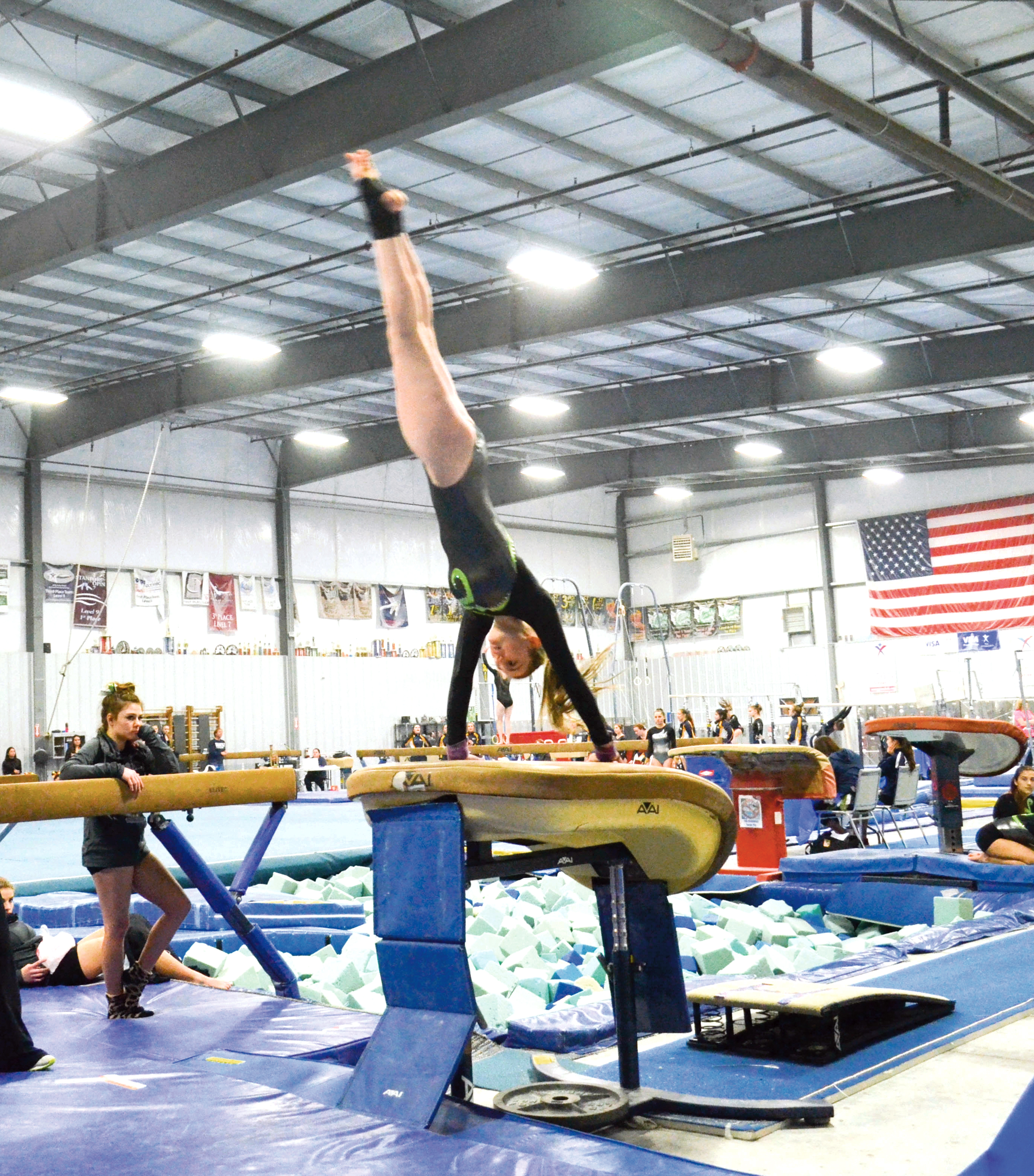 Port Angeles freshman Cassii Middlestead competes in the vault at the WOWI Invitational at Black Hills Gymnastics in Lacey. ()