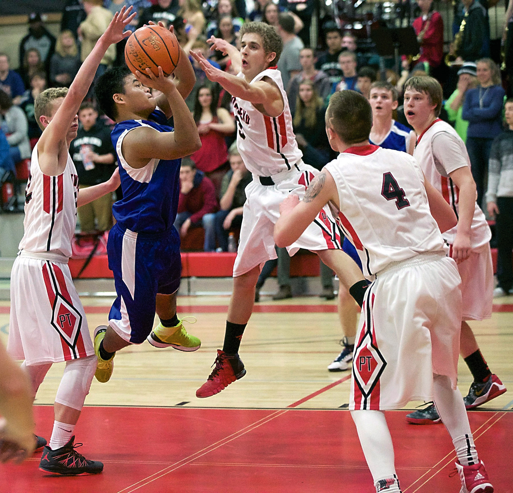 Chimacum's Victor Hitt goes up for a shot against Port Townsend's Patrick Charlton