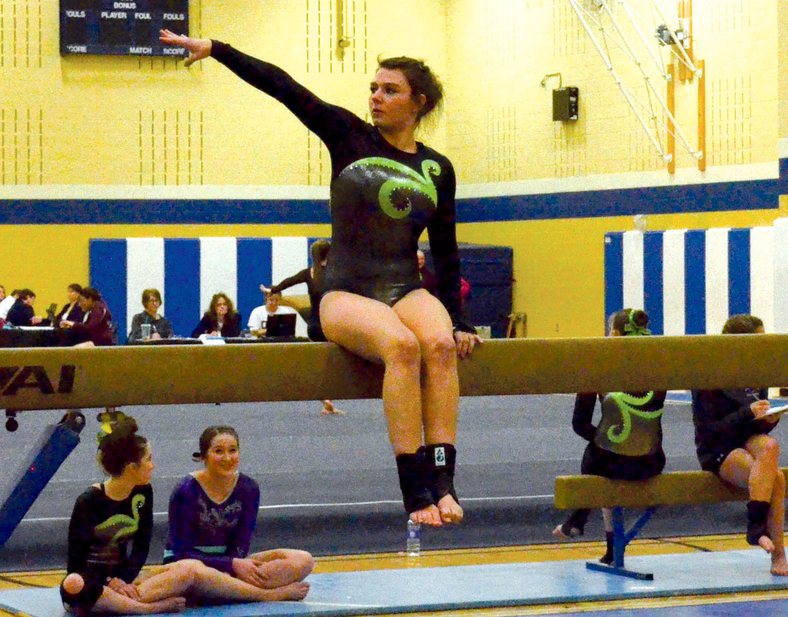 Port Angeles' Lexi Hefton performs on the balance beam at subregionals. Hefton is one of five Roughriders competing in the all-around at this weekends state competition. ()