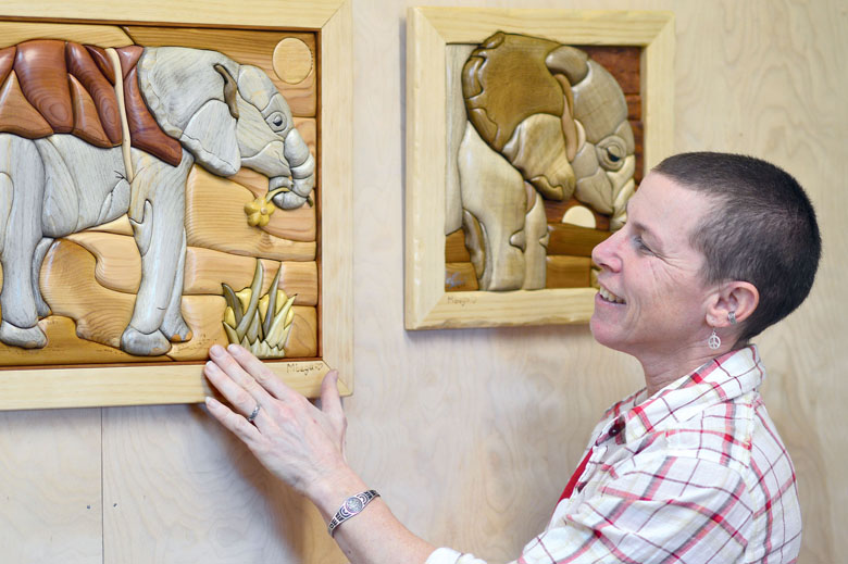 Sequim artist Sherri Lewis' wood mural will be auctioned online to raise money for the David Sheldrick Wildlife Trust