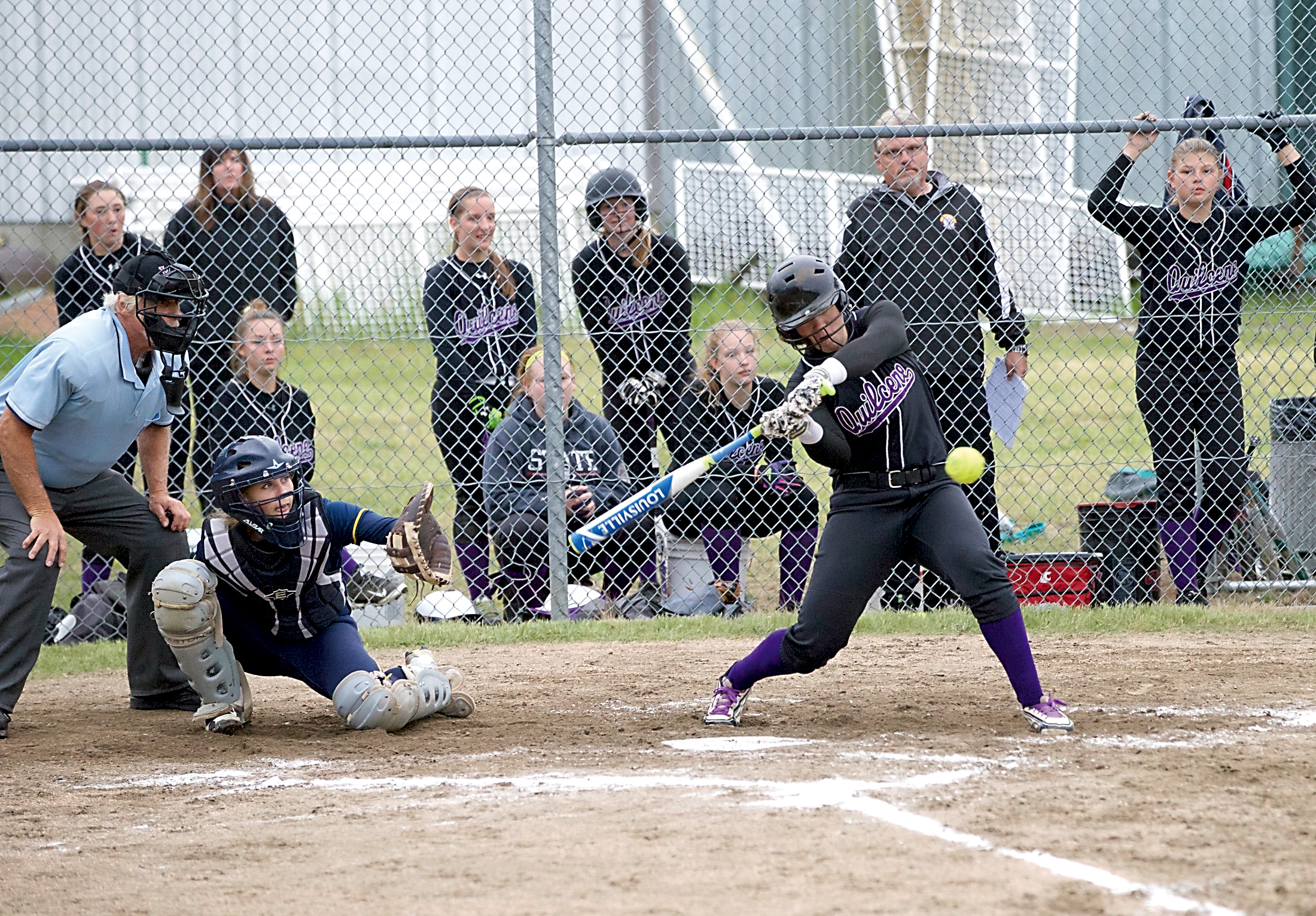 Erin Macedo drives in a run to lock up Quilcene's district tournament victory against the Naselle Comets. Macedo drove in six runs as the Rangers secured their sixth straight state berth with a 10-0 victory. (Steven Mullensky/for Peninsula Daily News)