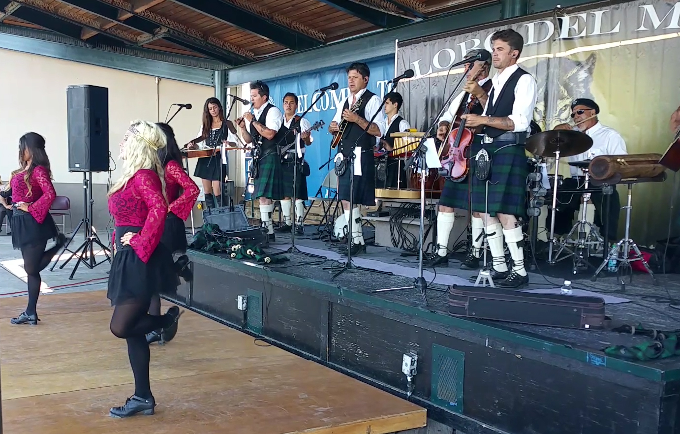 The musicians of Lobo Del Mar — in kilts — perform an Irish tune with dancers at the Concert on the Pier in Port Angeles on Wednesday.  —Photo by John Brewer/Peninsula Daily News