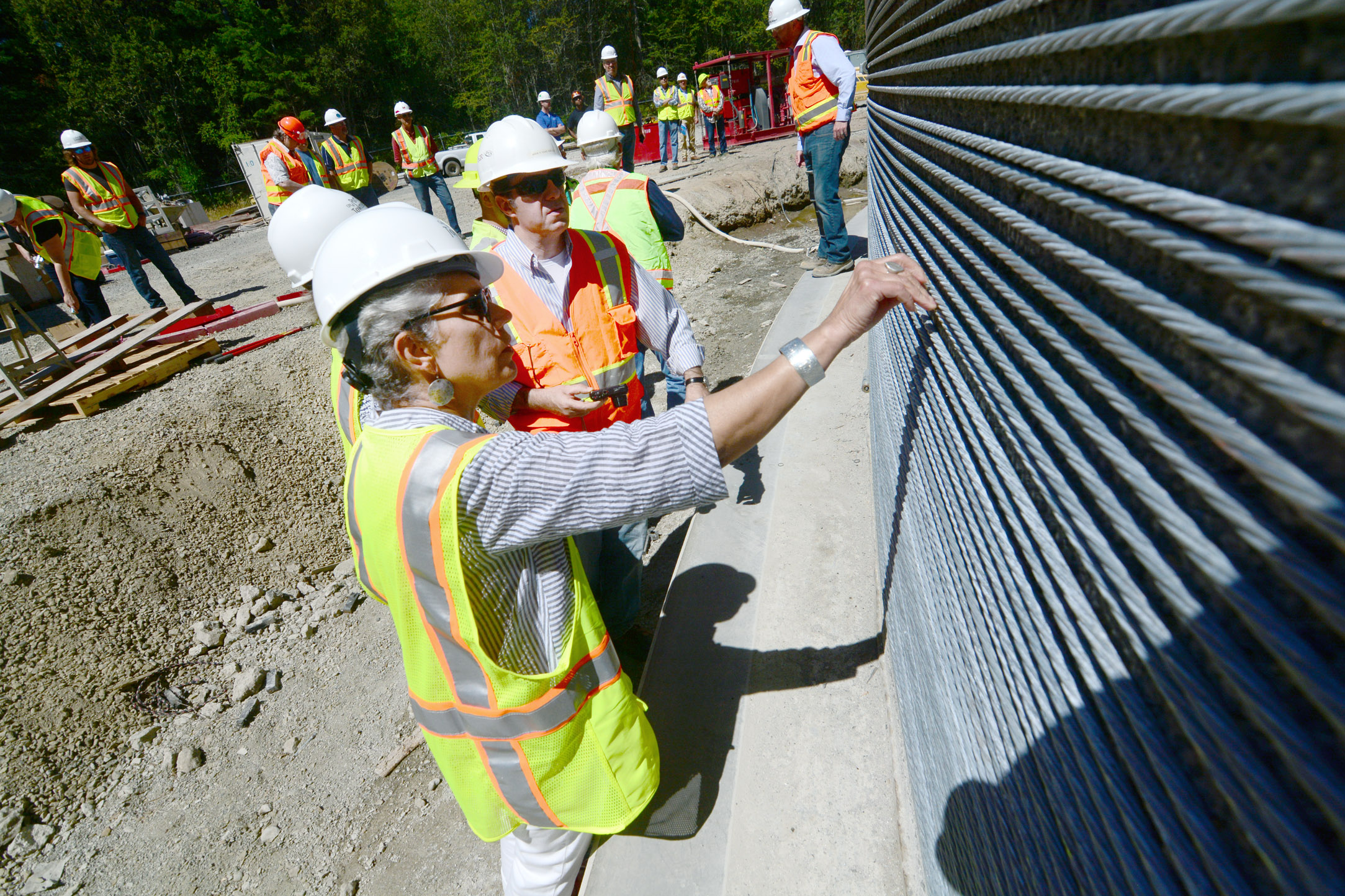 Port Townsend city officials take a close look at the city's 5 million-gallon reservoir project Wednesday. (Jesse Major/Peninsula Daily News)