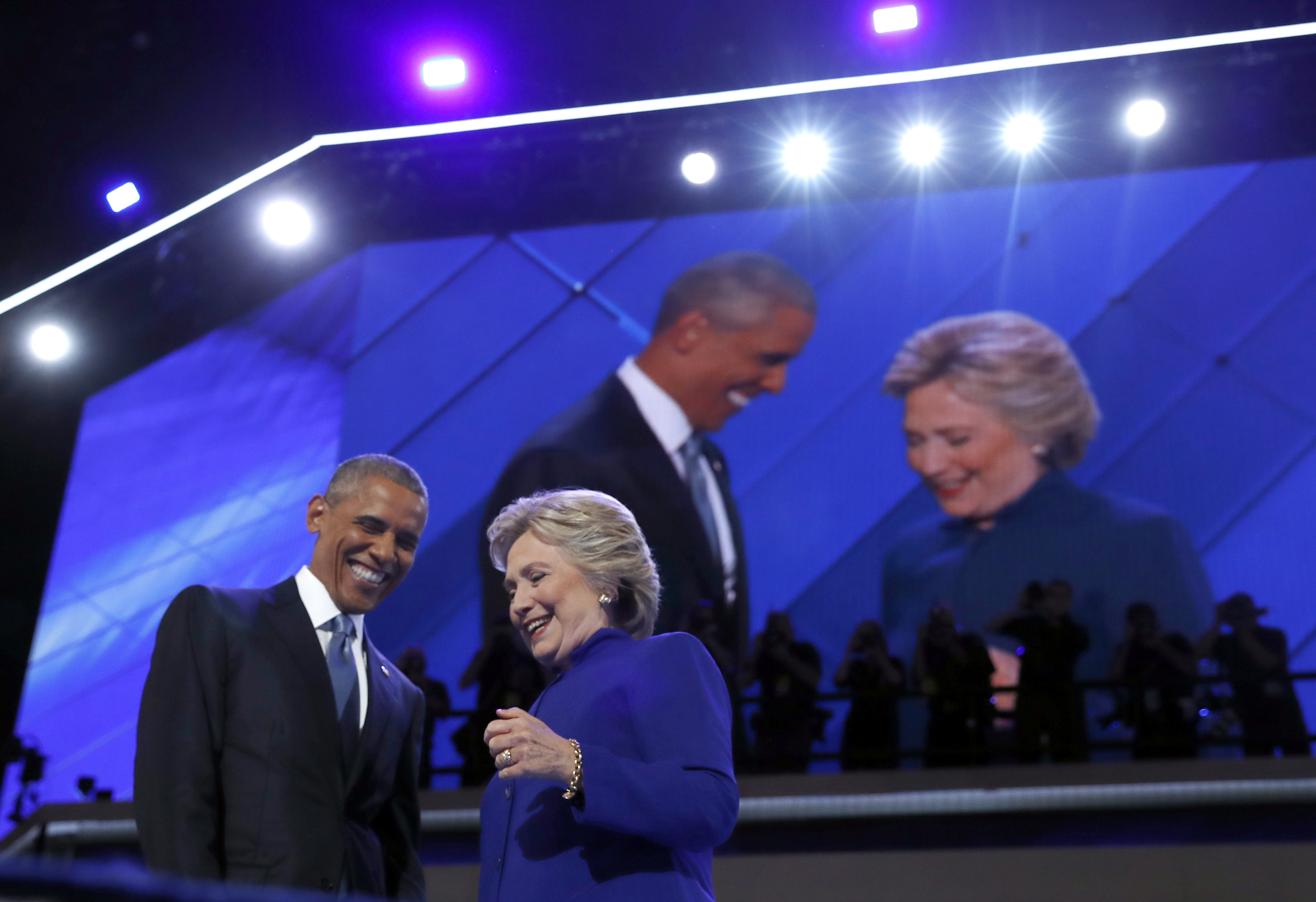 President Barack Obama is joined by Democratic presidential candidate Hillary Clinton after speaking to the delegates during the third day session of the Democratic National Convention in Philadelphia on Wednesday. (The Associated Press)