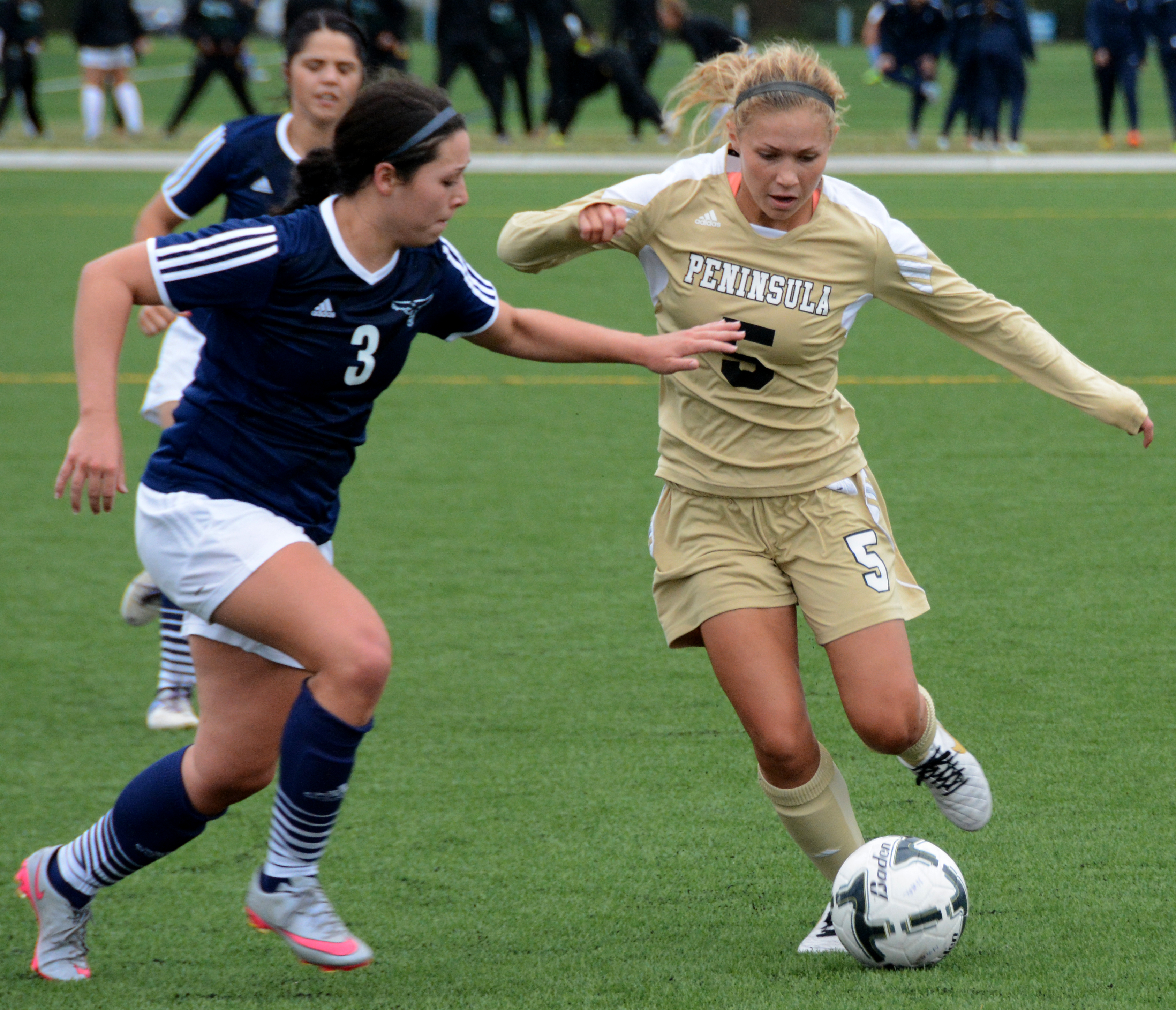 Peninsula's Ellie Small dribbles against Columbia Basin's Brittany Vickerman during the Pirates' 3-0 win. Small scored two goals at the NWAC Friendlies. Rick Ross/Peninsula College Athletics