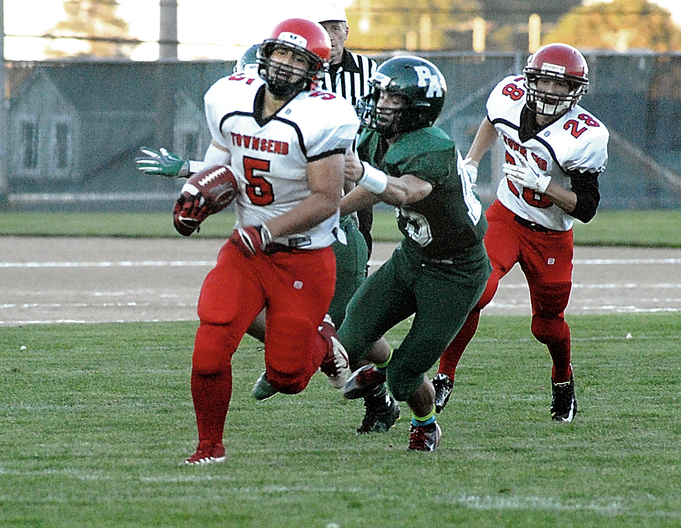David Sua runs against Port Angeles during the 2014 season opener. The Redhawks and Roughriders will meet again in tonight's season opener for both teams at Memorial Field in Port Townsend. Sequim and Chimacum also will play. Keith Thorpe/Peninsula Daily News
