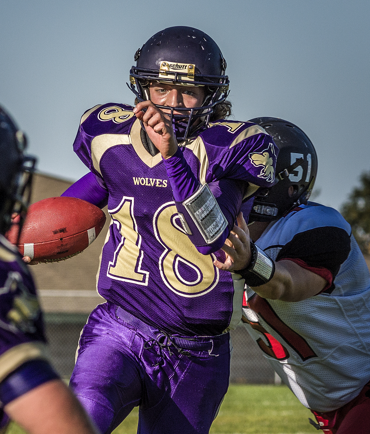 Sequim quarterback Nick Faunce eyes the goal line as he breaks away from Coupeville linebacker Julian Welling and scores on a 13-yard run. George Leinonen/for Peninsula Daily News