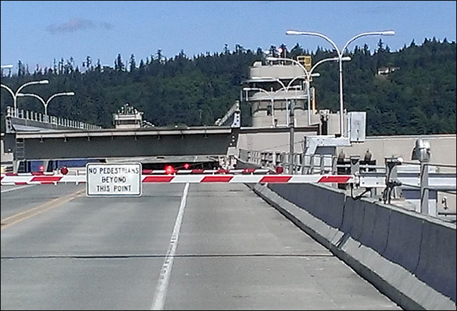 The Hood Canal Bridge was left stuck open Wednesday after the draw span came out of alignment with the bridge deck. KOMO News