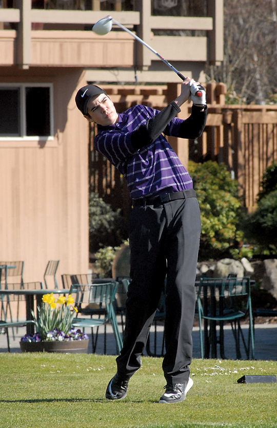Sequim's Blake Wiker tees off during a match against Port Angeles at The Cedars at Dungeness in Sequim. Wiker tied a personal best with a round of 1-over-par 37. (Keith Thorpe/Peninsula Daily News)