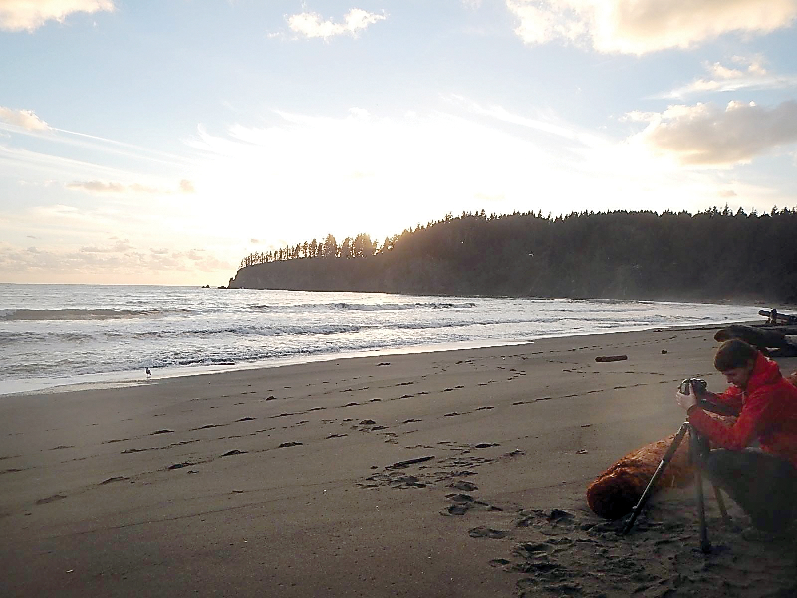 Filmmaker Eliza Goode shoots the sunset at Third Beach for her Olympic National Park movie