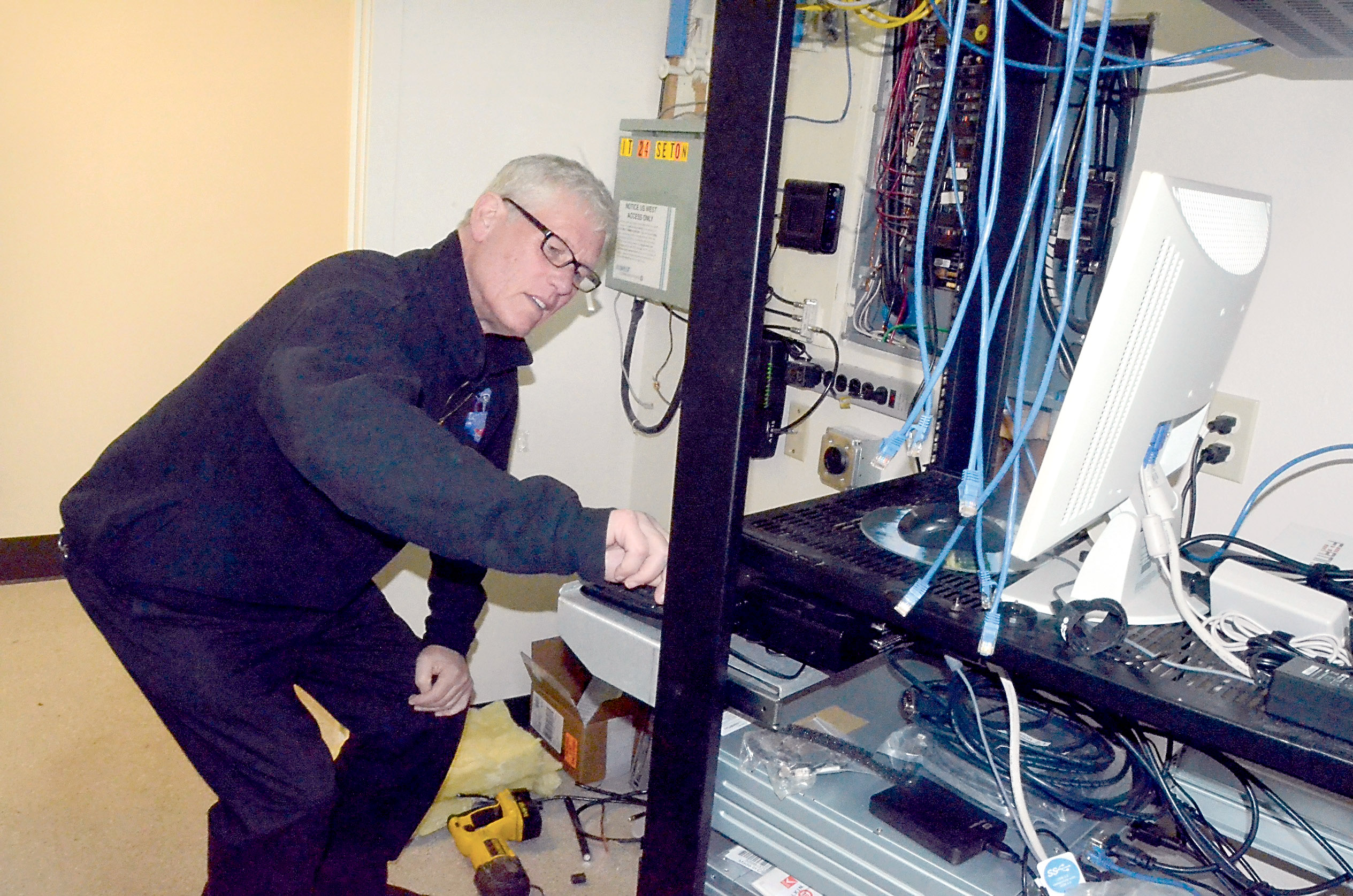 East Jefferson Fire-Rescue Chief Gordon Pomeroy connects a server in the departments new location