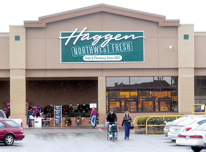 Shoppers emerge from the Haggen Northwest Fresh grocery store in Port Angeles last year. — Keith Thorpe/Peninsula Daily News ()