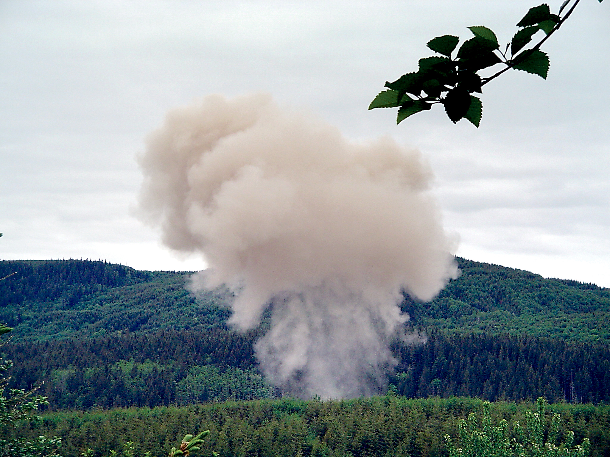 A cloud of smoke rises above the Souriau PA&E Bonded Metals blasting site west of Joyce. (Souriau PA&E Bonded Metals)