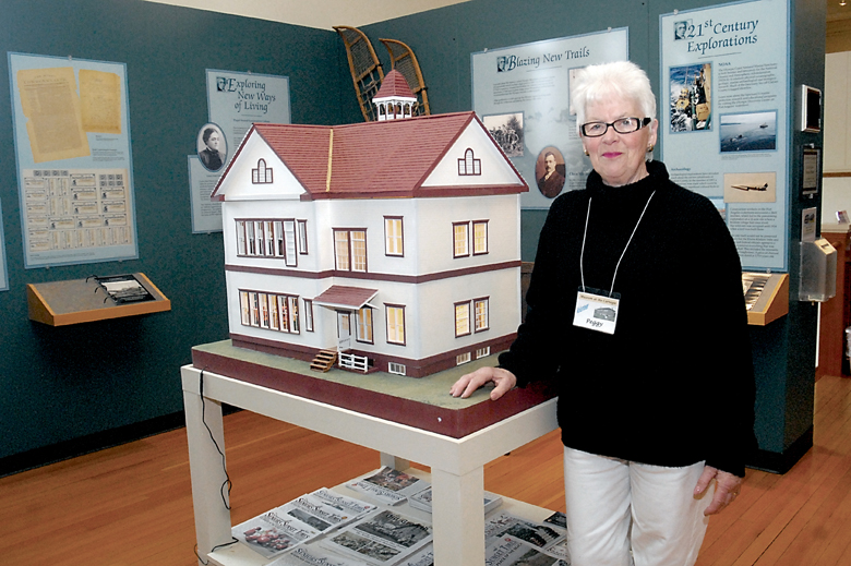 Peggy Norris at the Museum at the Carnegie in Port Angeles. Please click on arrow at upper right for photos of the other 2015 Clallam County Community Award recipients. (Keith Thorpe/Peninsula Daily News)